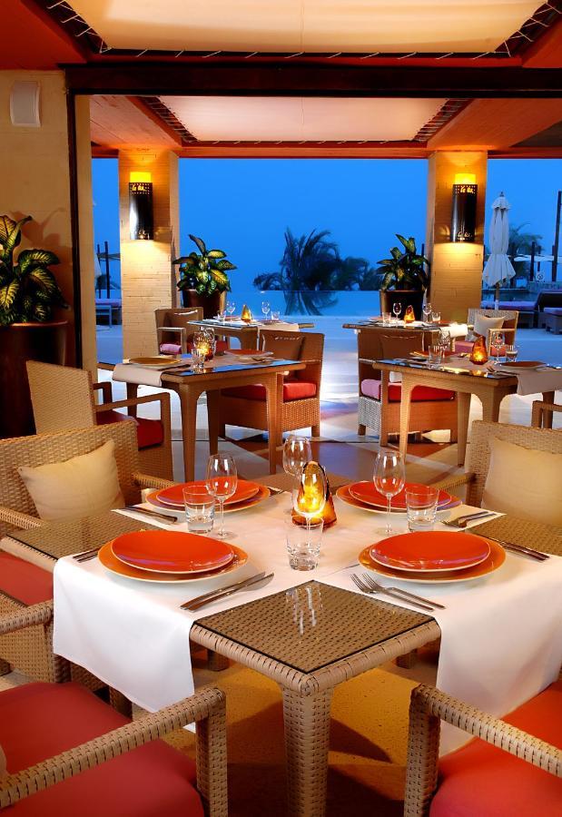 Retac Qunay Dahab Resort & Spa Exterior foto A restaurant at the Atlantis Paradise Island resort